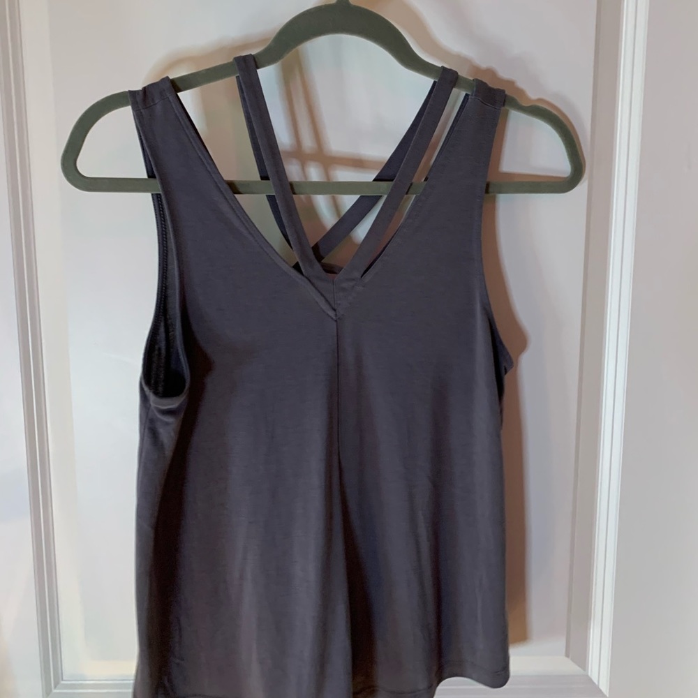Grey AE soft & sexy strappy & flowy tank top. Crisscross strappy size S